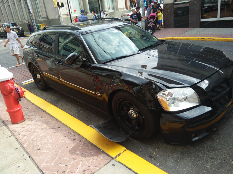 A sad sight indeed. Caused by someone who parked in a no parking zone and opened their door into traffic.